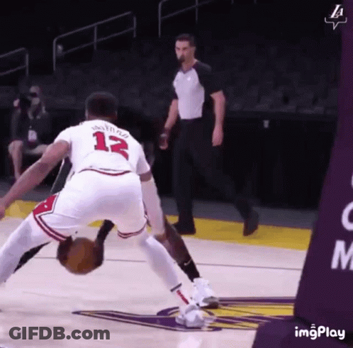 Basketball Player Number 13 Dribbling GIF
