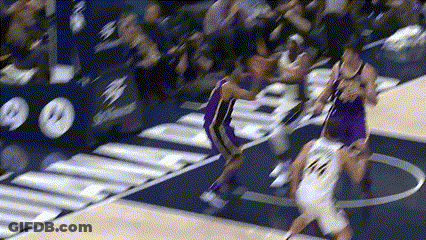 Basketball Player Number 14 Driving Past Defender GIF