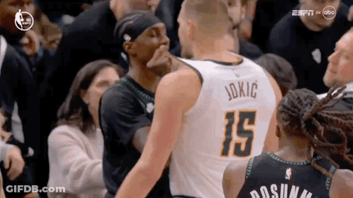 Basketball Player Number 15 Talking To Another GIF