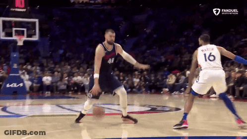 Basketball Player Number 16 Dribbling Ball GIF