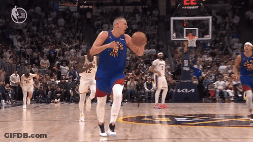 Basketball Player Number 19 Dribbling GIF