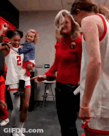 Basketball Player Number 2 Holding Child GIF