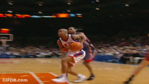 Basketball Player Number 21 Dribbling GIF