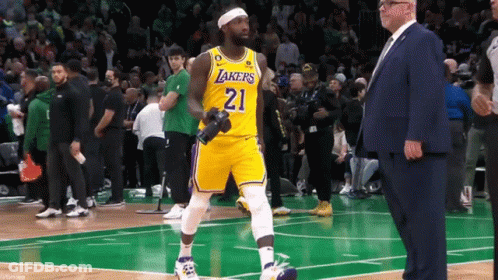 Basketball Player Number 21 Walking GIF