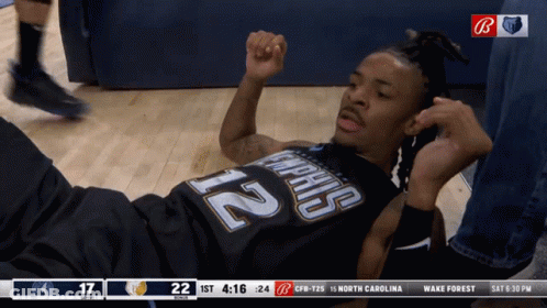 Basketball Player Number 22 Lying On Floor GIF