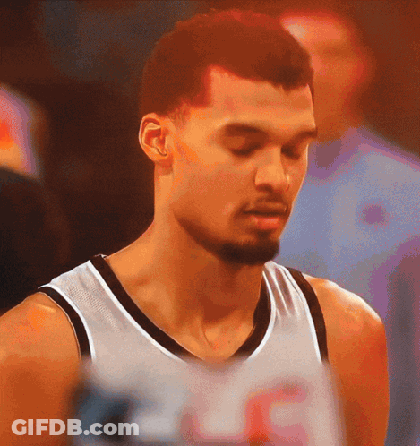 Basketball Player Number 23 Looking Down GIF