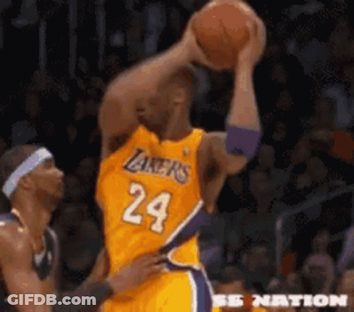 Basketball Player Number 24 Holding Ball Over Head GIF