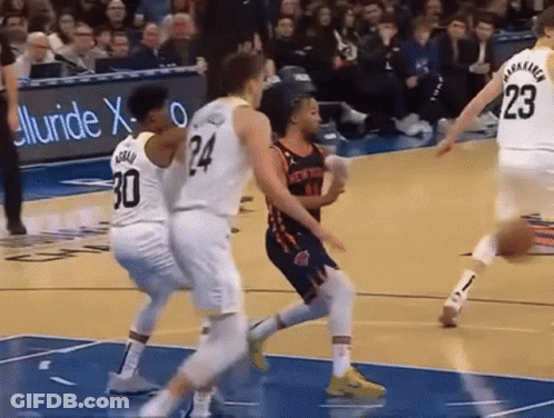 Basketball Player Number 24 Surrounded By Players GIF