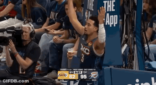 Basketball Player Number 3 Sitting In Stands GIF