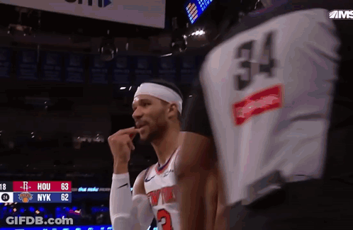 Basketball Player Number 34 Talking To Another GIF