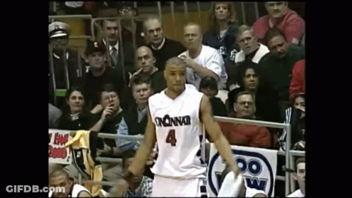 Basketball Player Number 4 Standing In Front Of Crowd GIF