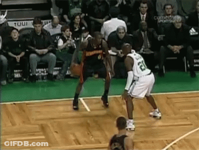 Basketball Player Number 52 Dribbling GIF