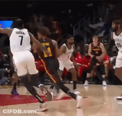 Basketball Player Number 7 Jumping Over GIF