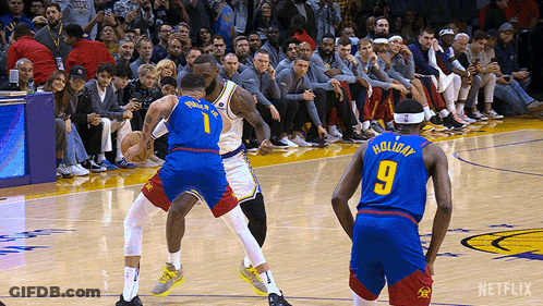 Basketball Player Number 9 Dribbling GIF
