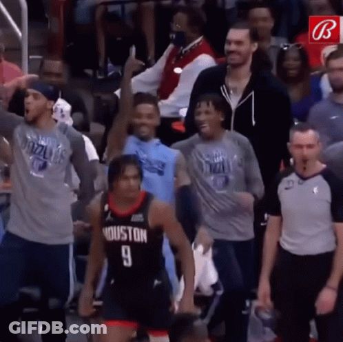 Basketball Player Number 9 Surrounded By Fans GIF