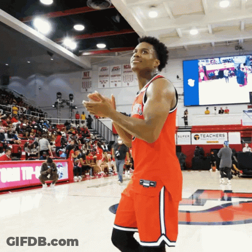 Basketball Player On Court In Front Of Teachers Sign GIF