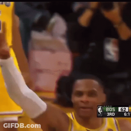 Basketball Player Raising Hand While Playing GIF