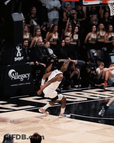 Basketball Player Running In Front Of Allegory Sign GIF