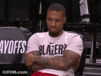 Basketball Player Sitting In Stands Arms Crossed Blazers Shirt GIF
