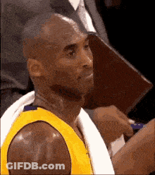 Basketball Player Sitting In Stands GIF