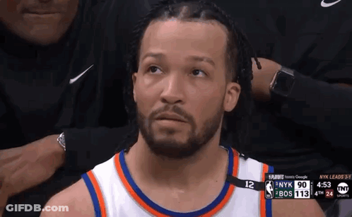 Basketball Player Sitting In Stands GIF