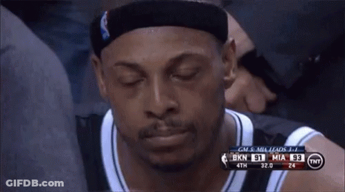 Basketball Player Sitting In Stands Eyes Closed GIF