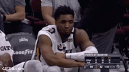 Basketball Player Sitting In Stands GIF
