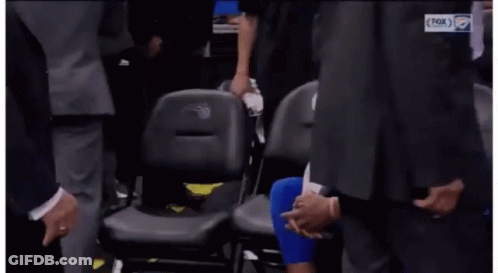 Basketball Player Sitting In Stands With Hands Folded GIF