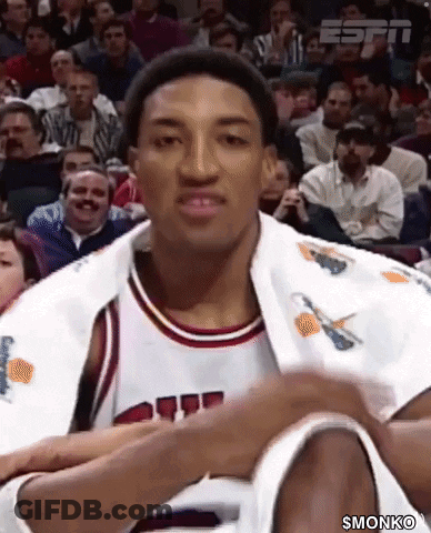 Basketball Player Sitting In White Jacket With Basketball GIF