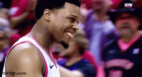 Basketball Player Smiling In Front Of Crowd GIF