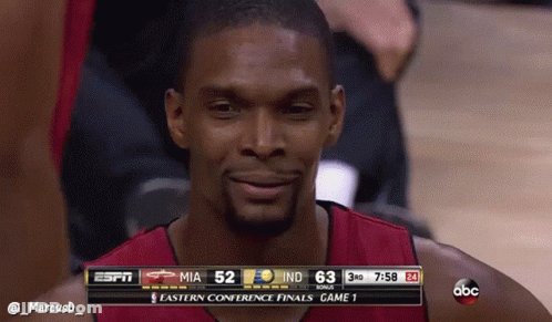 Basketball Player Smiling In Front Of ESPN Scoreboard GIF