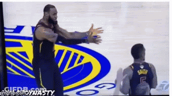 Basketball Player Smith In Front Of Golden State Warriors Logo GIF