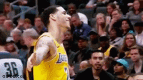 Basketball Player Standing In Front Of Crowd GIF