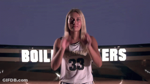Basketball Player Standing In Stands During Game GIF