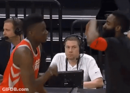 Basketball Player Talking To Referee With Man In Headset GIF