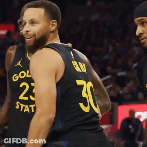 Basketball Player Wearing A Black Jersey With The Number 30 On The Back GIF
