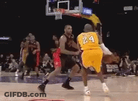 Basketball Player Wearing A Yellow Jersey With The Number 24 GIF
