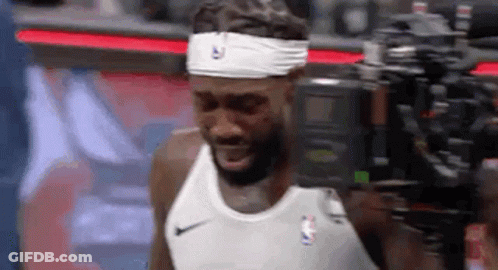 Basketball Player Wearing Headband And Tank Top GIF