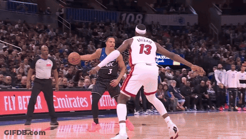 Basketball Player Wearing Number 13 Dribbles The Ball GIF