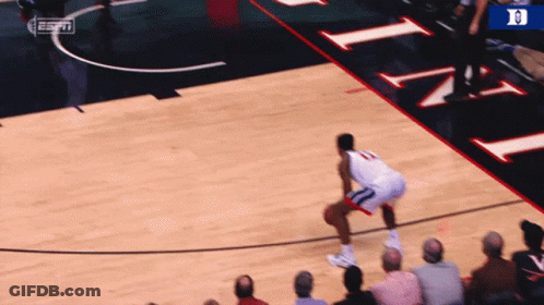 Basketball Player Wearing Number 13 Dribbling GIF