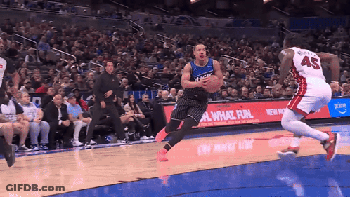 Basketball Player Wearing Number 45 Dribbling GIF