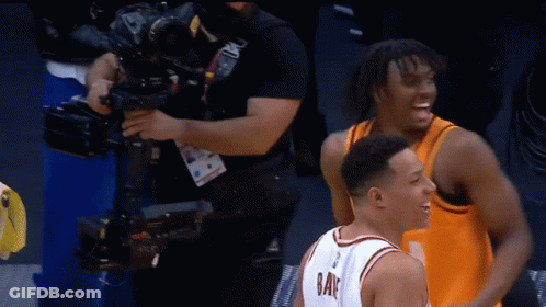 Basketball Player Wearing Number 8 Laughs GIF