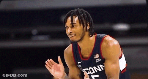 Basketball Player With Dreadlocks And Connecticut Jersey GIF