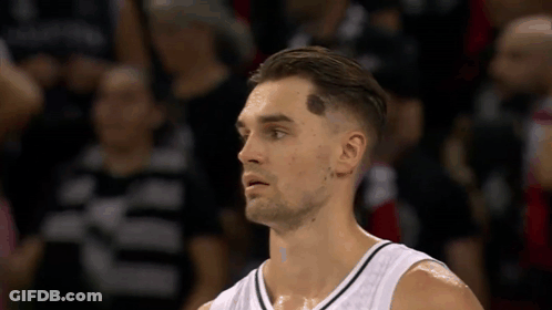Basketball Player With Forehead Tattoo Looks At Camera GIF