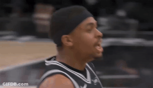 Basketball Player With Headband And Black And White Jersey GIF