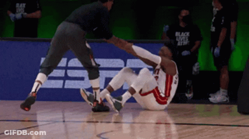 Basketball Player With Knee Injury Helped By Referee GIF