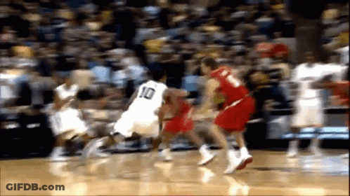 Basketball Player With Number 10 Dribbling Ball GIF