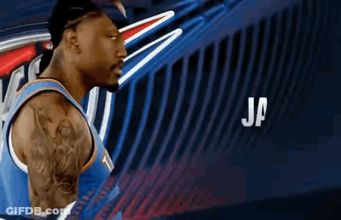 Basketball Player With Tattoo In Front Of Ja Sign GIF