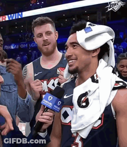 Basketball Player With Towel Being Interviewed GIF