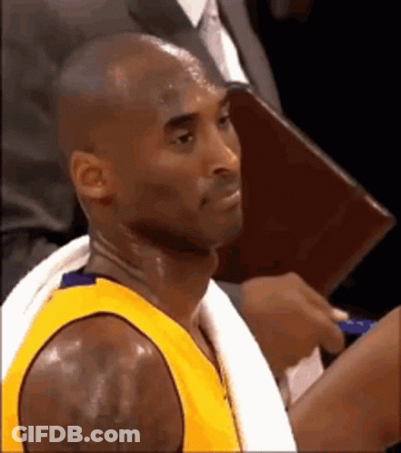 Basketball Player With Towel Looking GIF